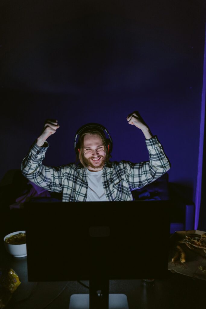 A Man in Black and White Plaid Long Sleeves using a Headphones